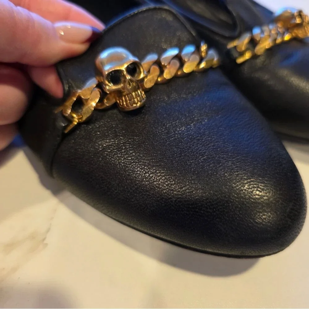 Alexander McQueen Black Leather Loafers with Gold Skull Detail